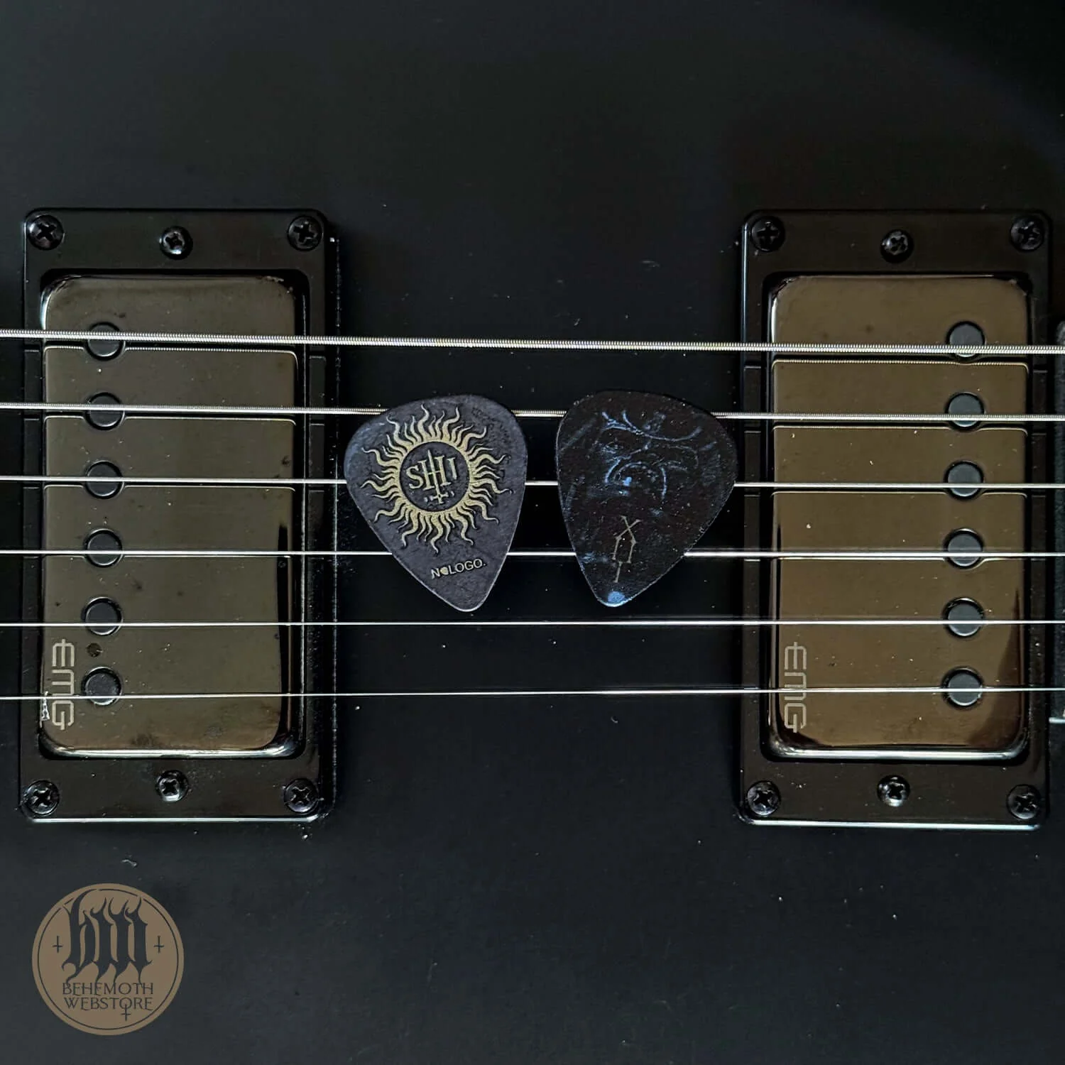 A plastic guitar pick Nergal 'TSOG Sigil'