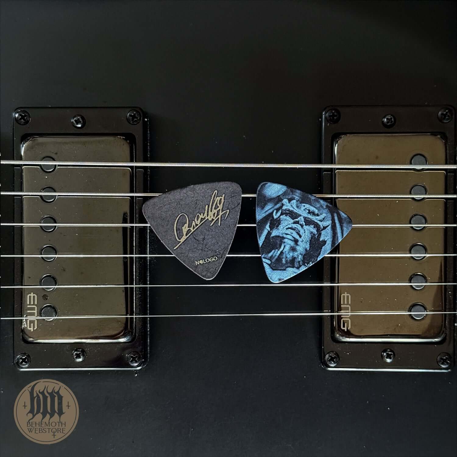 A plastic guitar pick Orion signature 'TSOG Cover'
